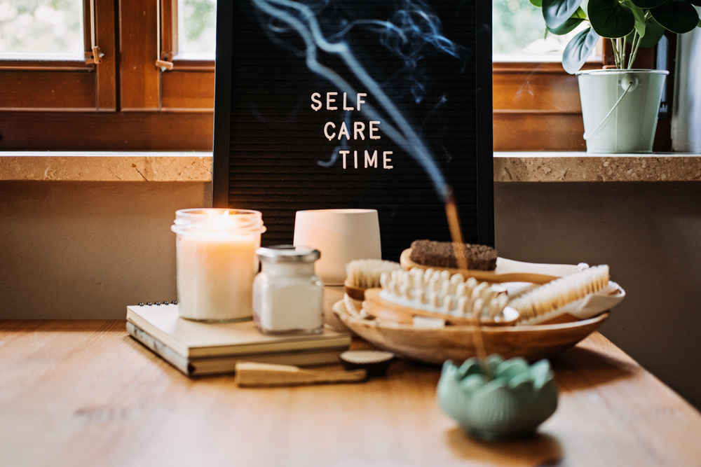 Self-care, Wellness concept. Letter board text Self Care Time, aroma sticks, body and self-care handmade cosmetics and natural organic beauty product